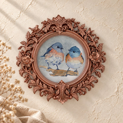 Bluebirds on a Snowy Branch round framed art print, rose gold baroque frame