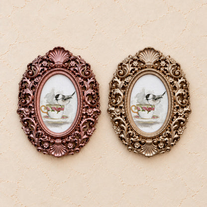 Chickadee on a Rose Teacup, gold and rose gold side by side