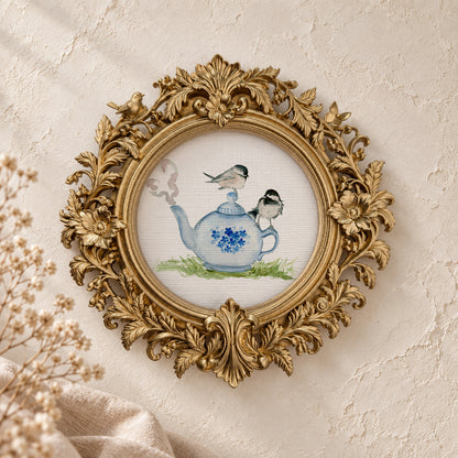 Chickadee on a Teapot round framed art print, gold baroque frame