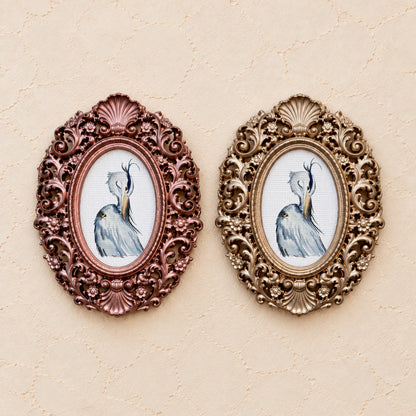 Heron Preening, gold and rose gold side by side