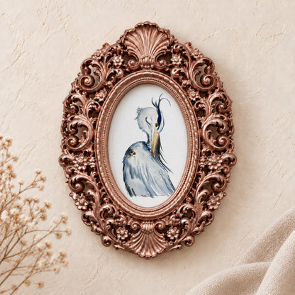 Heron Preening framed art print, rose gold baroque frame