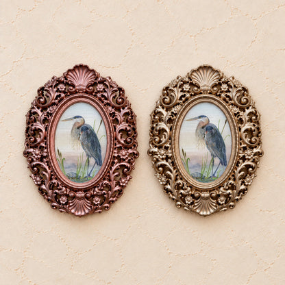 Heron and a Turtle, gold and rose gold side by side