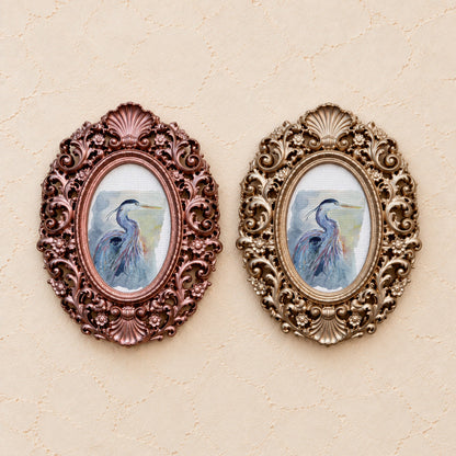 Heron in Blue, gold and rose gold side by side