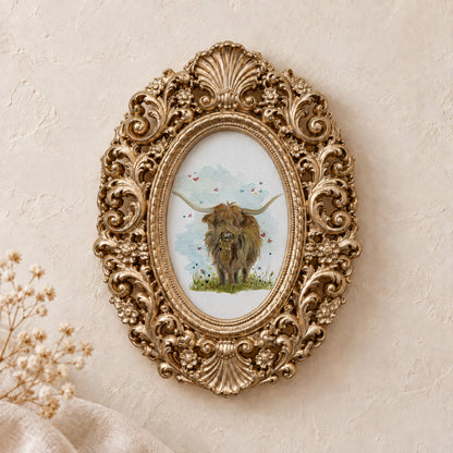Highland Cow and Butterflies framed art print, gold baroque frame