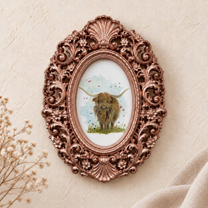 Highland Cow and Butterflies framed art print, rose gold baroque frame