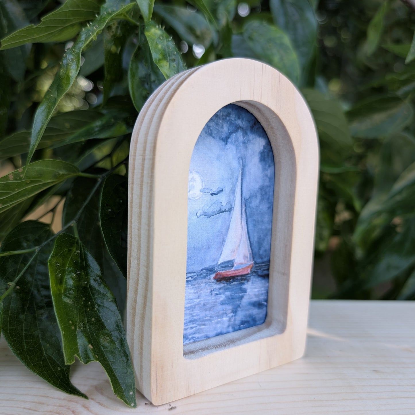 Mini Sailboat at Night Art Print in Solid Wood Arch Frame