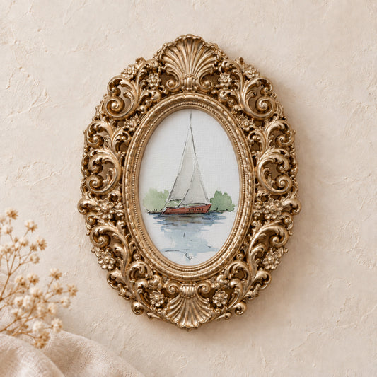 Red-Hulled Sailboat framed art print, gold baroque frame
