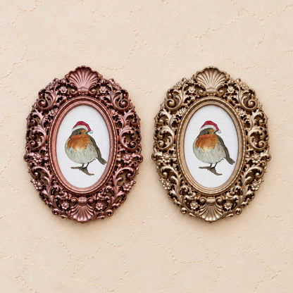 Robin in a Santa Hat, gold and rose gold side by side