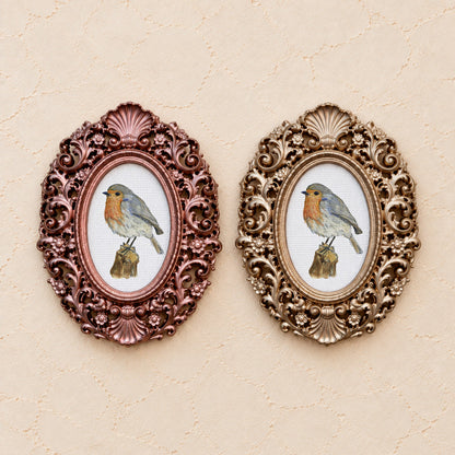Robin on a Post, gold and rose gold side by side