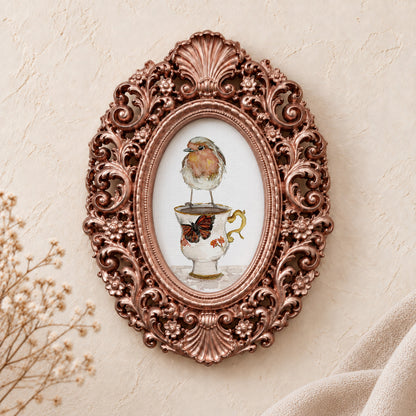 Robin on a Teacup framed art print, rose gold baroque frame